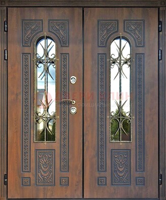 Двухстворчатая стальная дверь со стеклом и ковкой для дома ДСК-153 в Ульяновске