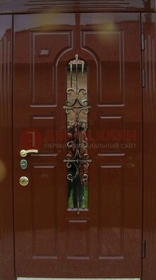 Красивая металлическая дверь со стеклом и ковкой ДСК-33 в Санкт-Петербурге